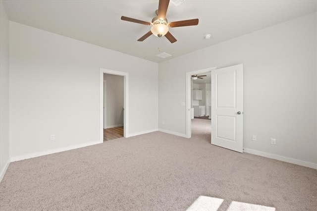 5201 Grassland Dr, Guthrie, OK 73044 - unfurnished bedroom featuring carpet flooring, baseboards, and a ceiling fan