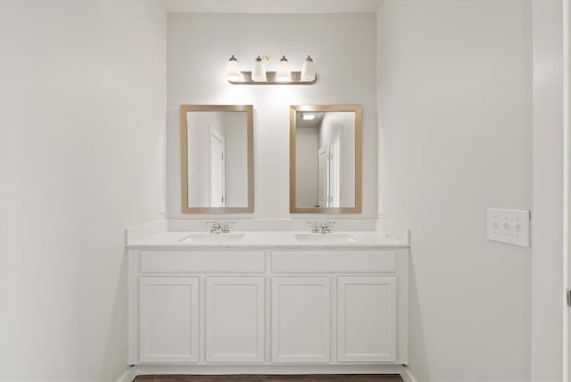 5201 Grassland Dr, Guthrie, OK 73044 - bathroom featuring double vanity and baseboards