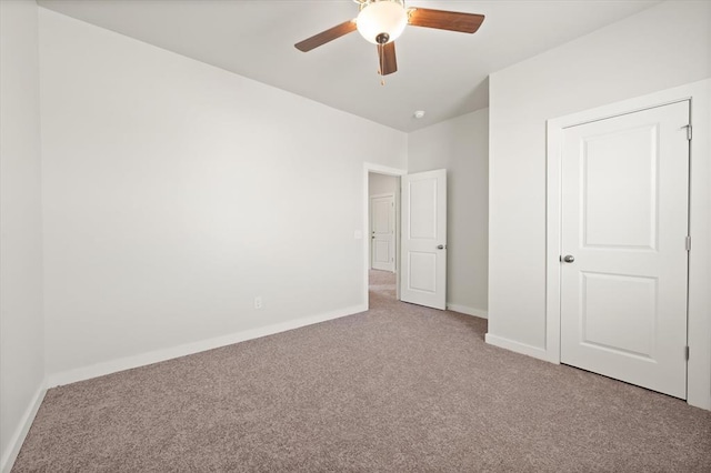 5201 Grassland Dr, Guthrie, OK 73044 - unfurnished bedroom with carpet, baseboards, and ceiling fan
