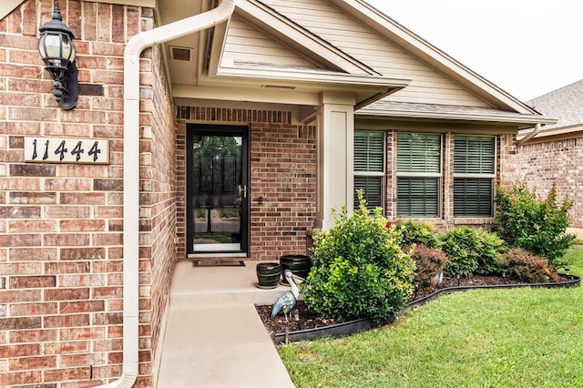 11444 NW 131st St, Piedmont, OK 73078 - view of exterior entry featuring brick siding