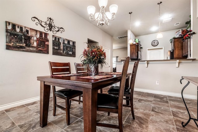 11444 NW 131st St, Piedmont, OK 73078 - dining room featuring baseboards, a chandelier, and stone finish floors