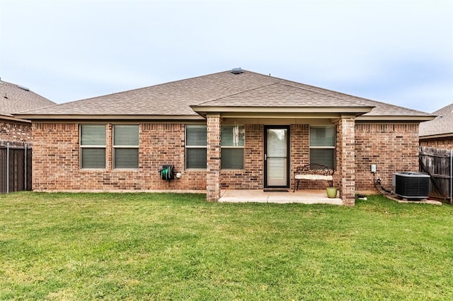 11444 NW 131st St, Piedmont, OK 73078 - back of house with central air condition unit, roof with shingles, and brick siding