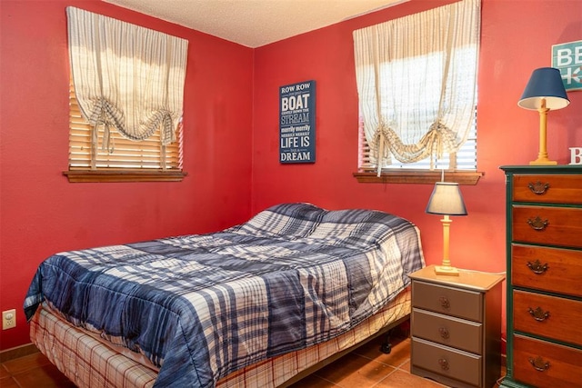 143 Robinson Ln, Ardmore, OK 73401 - bedroom featuring tile patterned floors