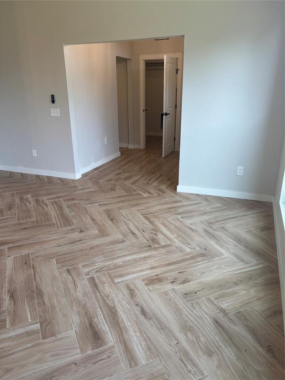 10501 Reiter Dr, Midwest City, OK 73130 - spare room featuring baseboards