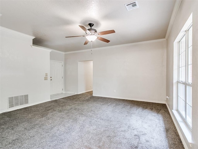 105 Taos, Edmond, OK 73013 - carpeted spare room with a ceiling fan and crown molding