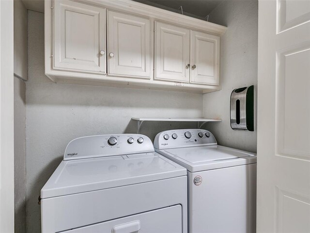 105 Taos, Edmond, OK 73013 - washroom featuring washing machine and clothes dryer and cabinet space