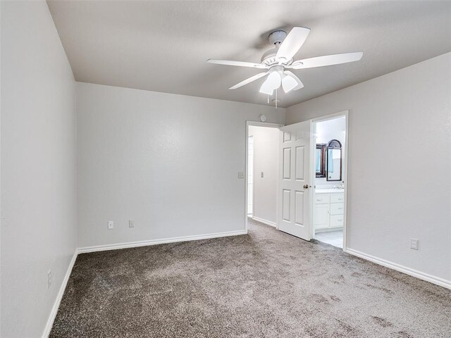 105 Taos, Edmond, OK 73013 - carpeted empty room with ceiling fan and baseboards