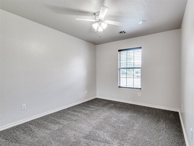 105 Taos, Edmond, OK 73013 - unfurnished room featuring carpet floors, a ceiling fan, and a textured ceiling