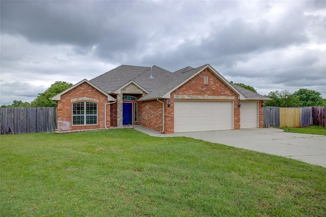 811 W Abi Rd, Washington, OK 73093 - view of front of home featuring a garage, brick siding, driveway, and a shingled roof