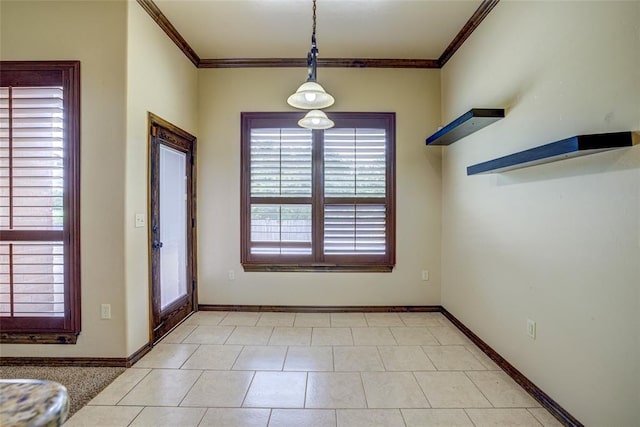 811 W Abi Rd, Washington, OK 73093 - unfurnished dining area featuring healthy amount of natural light, crown molding, and baseboards