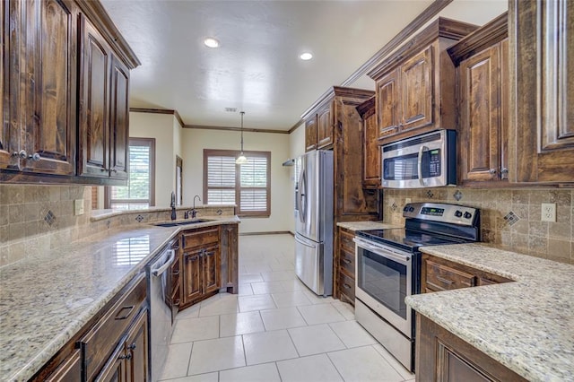 811 W Abi Rd, Washington, OK 73093 - kitchen featuring stainless steel appliances, a sink, light tile patterned flooring, decorative backsplash, and crown molding
