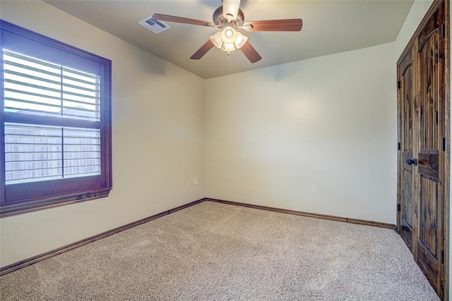 811 W Abi Rd, Washington, OK 73093 - empty room with carpet floors, ceiling fan, and baseboards