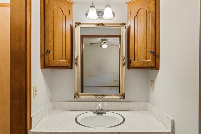 1112 E 11th St, Edmond, OK 73034 - bathroom with vanity and ceiling fan