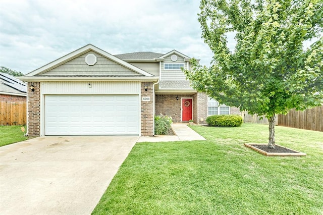 5008 Caleb St, Oklahoma City, OK 73179 - view of front of home featuring concrete driveway, a garage, and brick siding