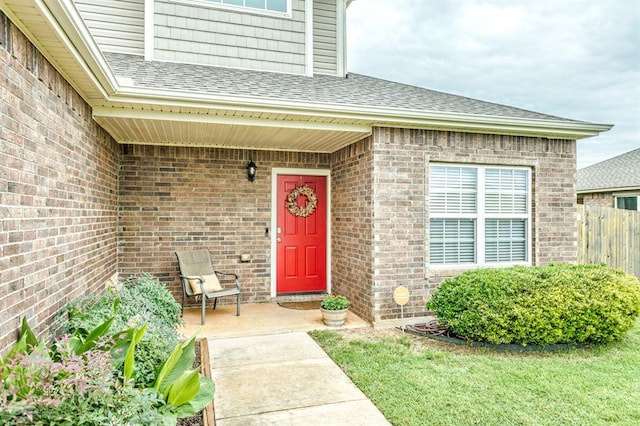 5008 Caleb St, Oklahoma City, OK 73179 - property entrance with brick siding and roof with shingles