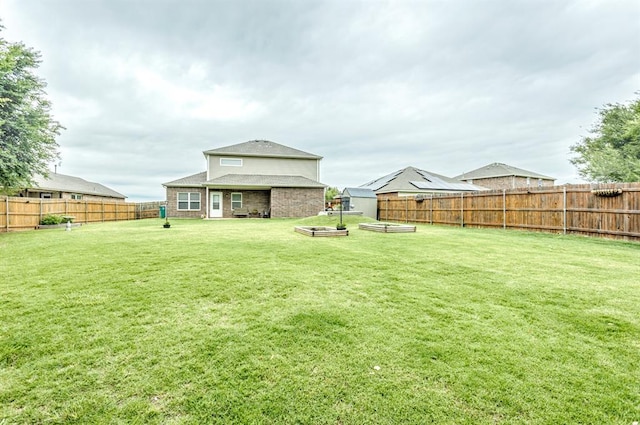5008 Caleb St, Oklahoma City, OK 73179 - view of yard with a garden