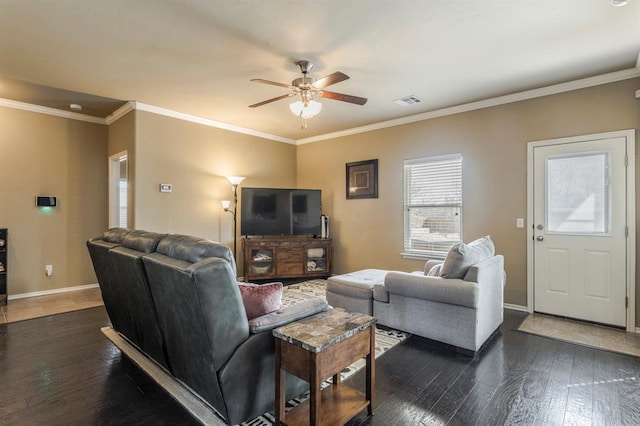 5008 Caleb St, Oklahoma City, OK 73179 - living area with a ceiling fan, dark wood-style floors, ornamental molding, and baseboards