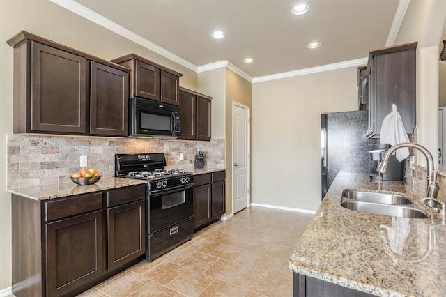 5008 Caleb St, Oklahoma City, OK 73179 - kitchen with black appliances, a sink, dark brown cabinetry, ornamental molding, and light stone counters