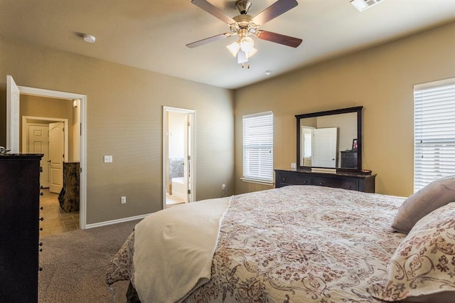 5008 Caleb St, Oklahoma City, OK 73179 - carpeted bedroom featuring baseboards, a ceiling fan, and ensuite bath