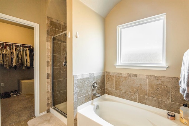 5008 Caleb St, Oklahoma City, OK 73179 - full bath with a garden tub, a walk in closet, a shower stall, and vaulted ceiling