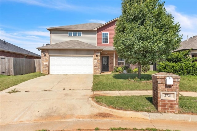 2721 Demotte Dr, Yukon, OK 73099 - view of front facade with driveway and a shingled roof