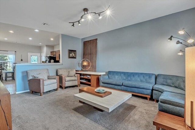 2721 Demotte Dr, Yukon, OK 73099 - living room featuring light carpet and recessed lighting