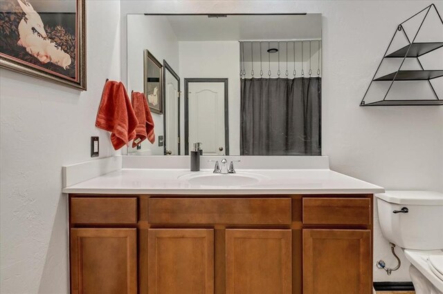 2721 Demotte Dr, Yukon, OK 73099 - bathroom with toilet, vanity, and a shower with curtain
