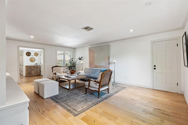2241 NW 56th St, Oklahoma City, OK 73112 - living room featuring light wood-style flooring, recessed lighting, and baseboards