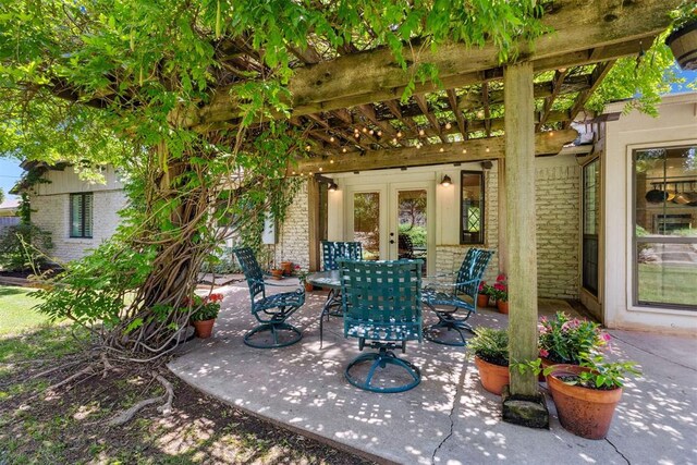 2241 NW 56th St, Oklahoma City, OK 73112 - view of patio featuring french doors, a pergola, and outdoor dining space