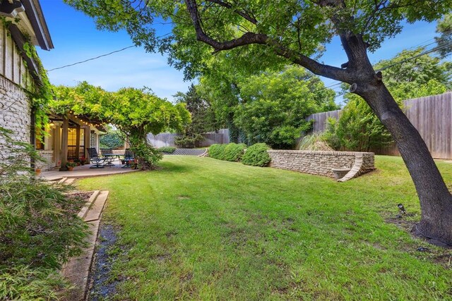 2241 NW 56th St, Oklahoma City, OK 73112 - view of yard featuring a patio