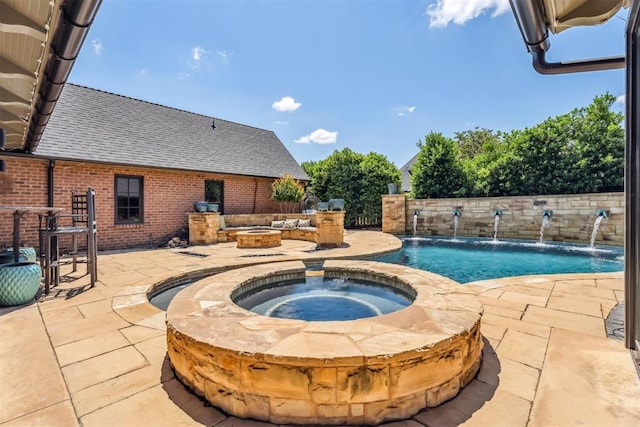 1324 NW 157th St, Edmond, OK 73013 - view of swimming pool with an in-ground hot tub, a fire pit, a patio area, and a fenced backyard