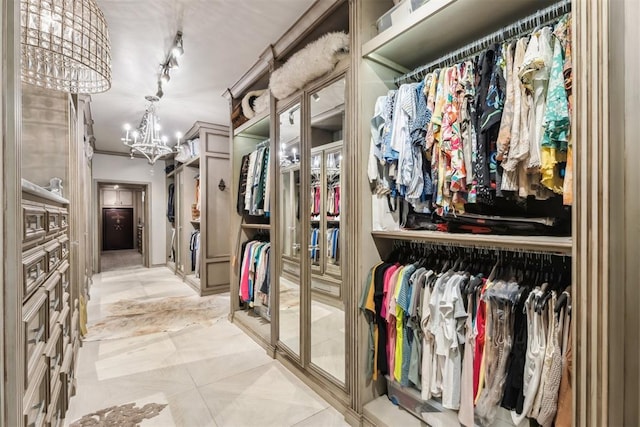 1324 NW 157th St, Edmond, OK 73013 - spacious closet featuring a chandelier