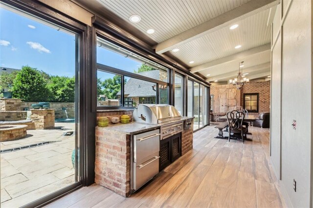 1324 NW 157th St, Edmond, OK 73013 - sunroom featuring beamed ceiling and a chandelier