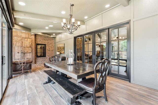 1324 NW 157th St, Edmond, OK 73013 - dining area with french doors, light wood-style flooring, a chandelier, beam ceiling, and recessed lighting