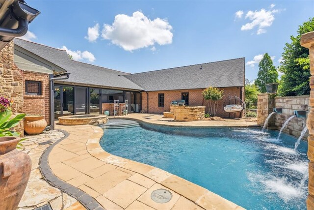 1324 NW 157th St, Edmond, OK 73013 - view of pool with a pool with connected hot tub, exterior kitchen, and a patio area