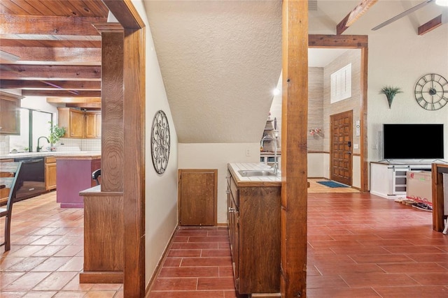 13220 Shady Tree Pl, Edmond, OK 73013 - hall featuring beamed ceiling, a sink, and baseboards