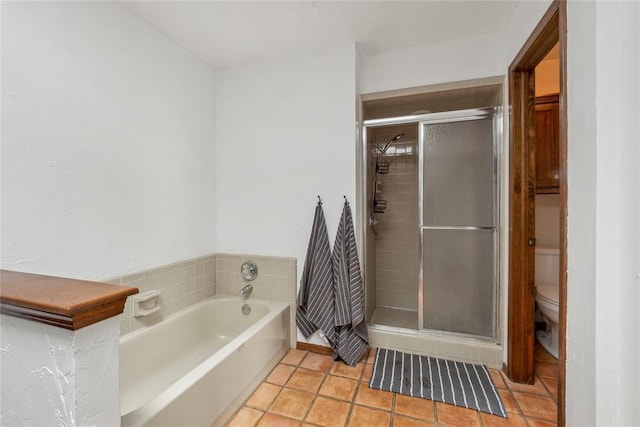 13220 Shady Tree Pl, Edmond, OK 73013 - bathroom with toilet, a shower stall, a bath, and tile patterned flooring