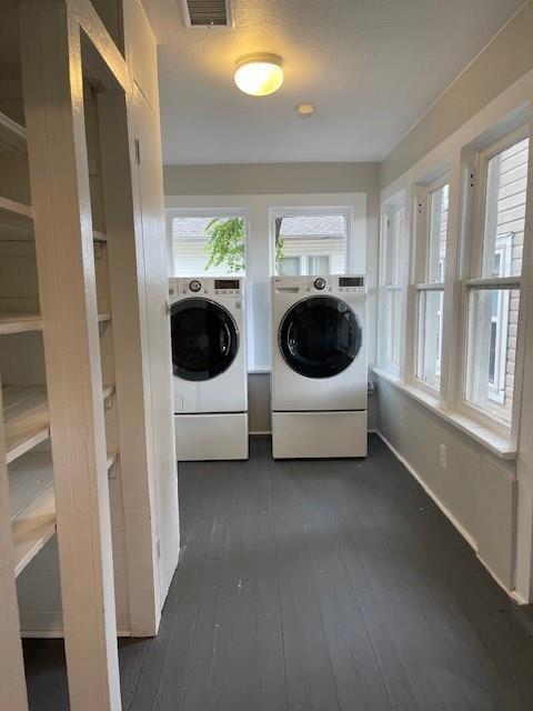 306 E Hughbert St, Norman, OK 73069 - laundry room with washer and clothes dryer, dark wood-style floors, and baseboards