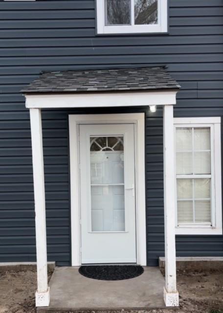 306 E Hughbert St, Norman, OK 73069 - entrance to property featuring a shingled roof
