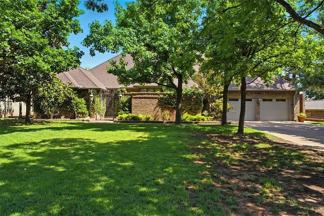 1409 Glenbrook Ter, Nichols Hills, OK 73116 - obstructed view of property featuring concrete driveway and an attached garage