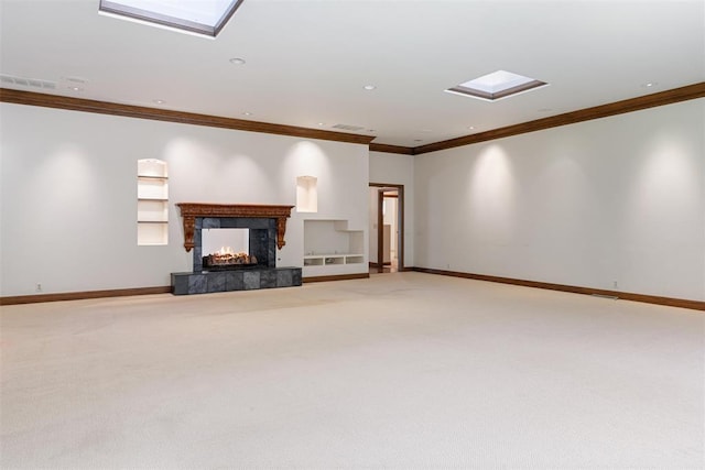 1409 Glenbrook Ter, Nichols Hills, OK 73116 - unfurnished living room featuring a skylight, crown molding, carpet, a multi sided fireplace, and recessed lighting
