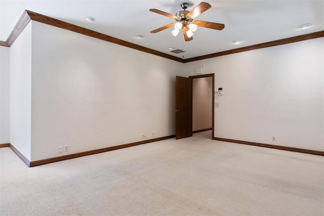 1409 Glenbrook Ter, Nichols Hills, OK 73116 - spare room featuring light colored carpet, ornamental molding, baseboards, a ceiling fan, and recessed lighting