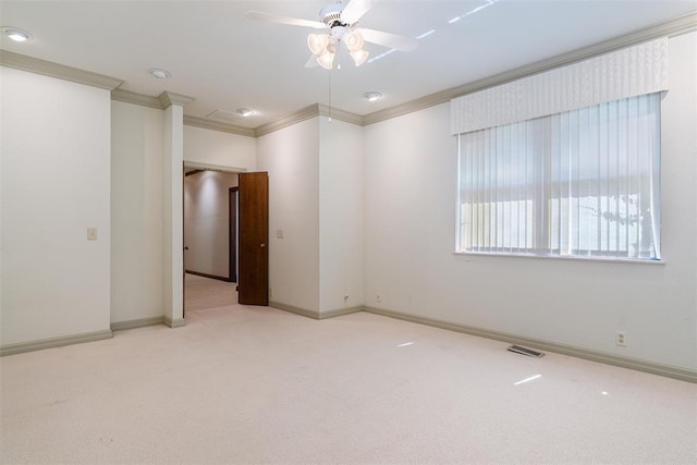 1409 Glenbrook Ter, Nichols Hills, OK 73116 - carpeted empty room with ornamental molding, a ceiling fan, and baseboards
