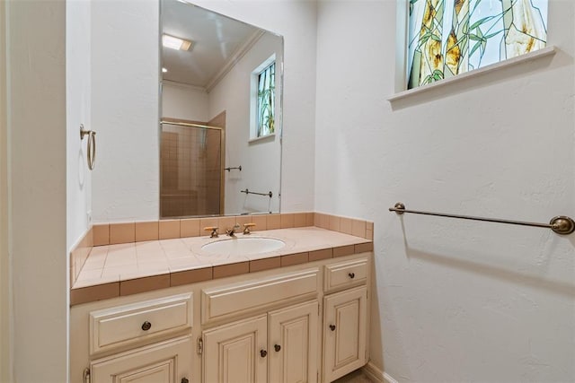 1409 Glenbrook Ter, Nichols Hills, OK 73116 - bathroom with vanity, crown molding, and an enclosed shower