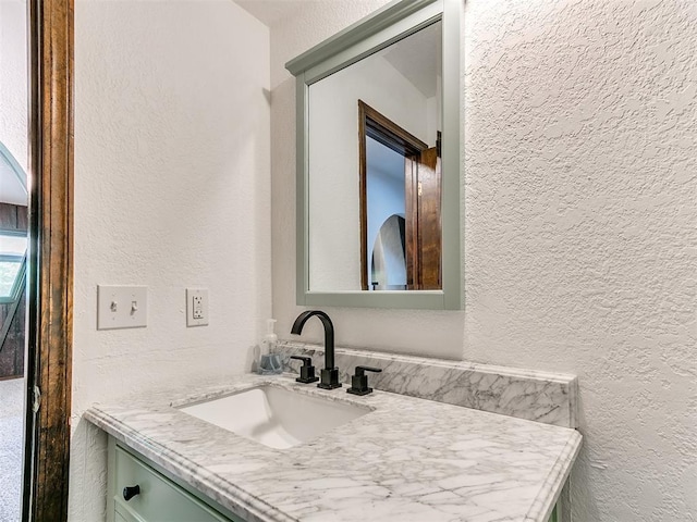 10109 Bison Cir, Yukon, OK 73099 - bathroom with a textured wall and vanity