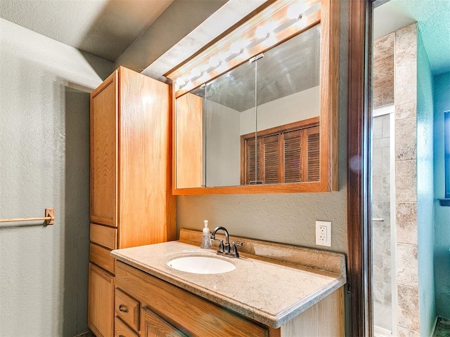 10109 Bison Cir, Yukon, OK 73099 - bathroom with vanity and a textured wall