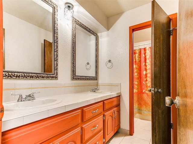10109 Bison Cir, Yukon, OK 73099 - bathroom with double vanity, tile patterned flooring, and a shower with curtain