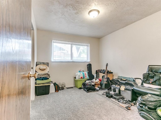 10109 Bison Cir, Yukon, OK 73099 - game room with carpet and a textured ceiling