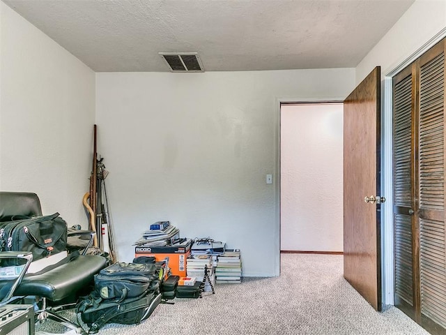 10109 Bison Cir, Yukon, OK 73099 - carpeted bedroom with a closet and baseboards