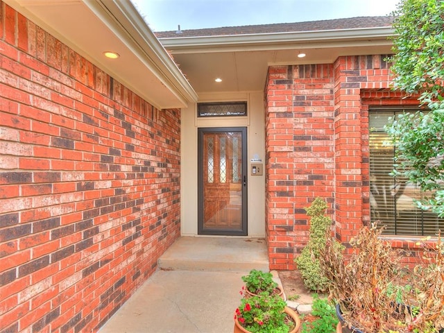 12104 Cantle Rd, Oklahoma City, OK 73120 - doorway to property with brick siding